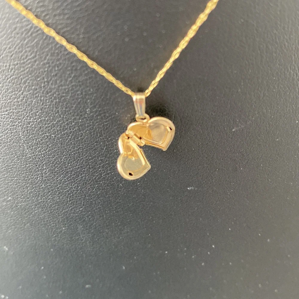 Mignonette NWOT gold, and diamond heart locket necklace